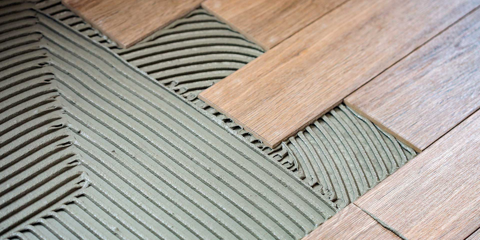 Flooring adhesive curing and floor protection